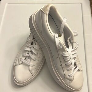 White Adidas Sleek womens size 7.